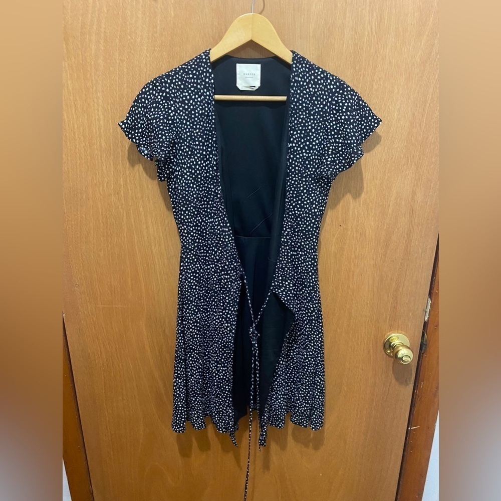 Woman dresses Harpe heritage